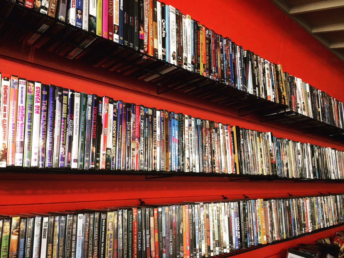 Just loaded the DVD racks with two boxes of great titles and they are packed! Come check it out!
