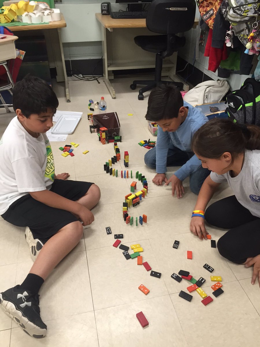 SucheckiMaureen's tweet photo. STEM-Energy and Collision- Building intricate domino chains and testing them! #iginspires https://t.co/V9Q0fymRnX