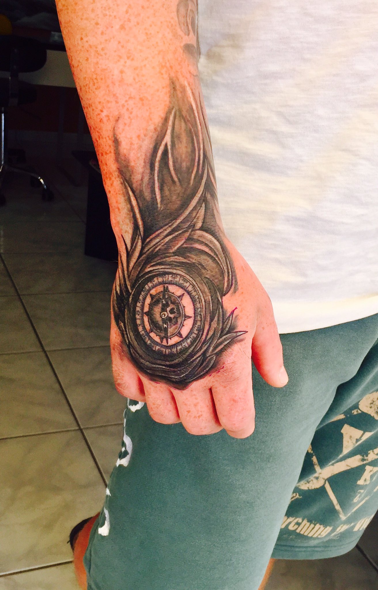 Compass tattoo hand deals