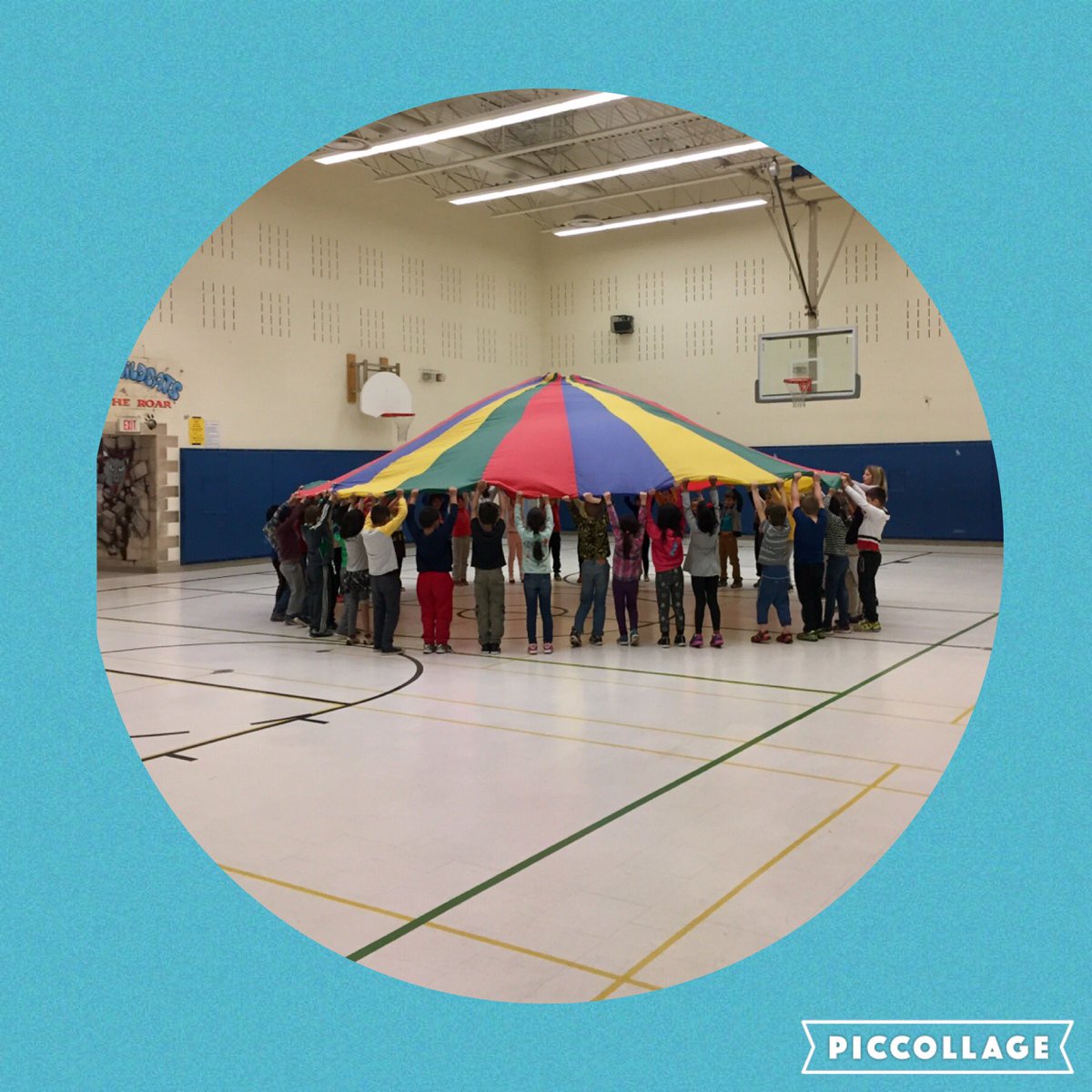 Oh, the smiles and excitement shared when we all work together! #parachutegames #PhysEd #crosscurricular connections to science #air&amp;water