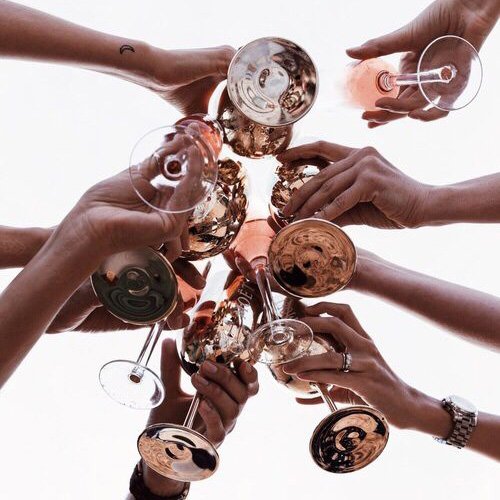 CHEERS! No better excuse to clink glasses with your squad than National Wine Day! #nationwineday