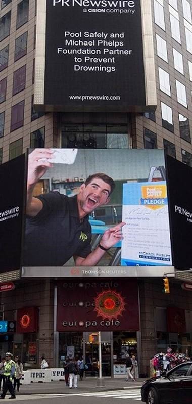 Looking good in #timessquare, <a href="/MichaelPhelps/">Michael Phelps</a>. Be like Michael and take the <a href="/poolsafely/">Pool Safely</a> pledge. poolsafely.gov/pledge