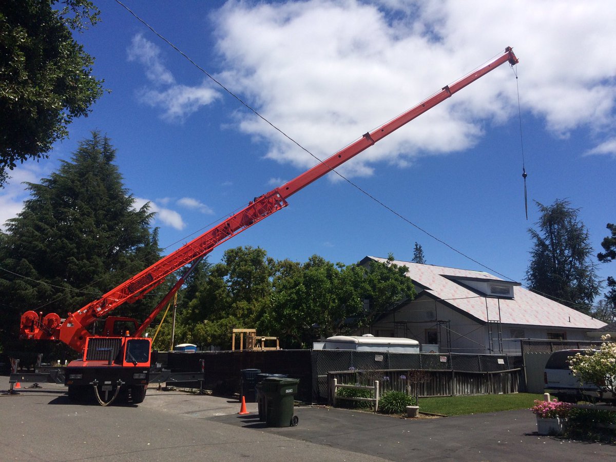 OneSkyHomes's tweet photo. Jobsite delivery of our @ZolaWindows means a crane for the large lift&amp;slide door to the back yard. #PassiveHouse. https://t.co/yreaOsIrN1