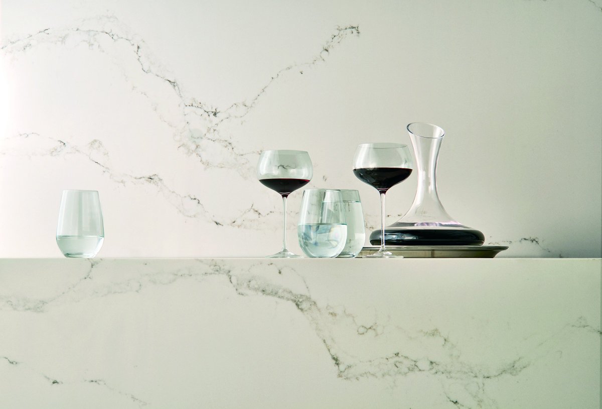 Happy #NationalWineDay! We're celebrating with Statuario Nuvo and a glass of red vino.