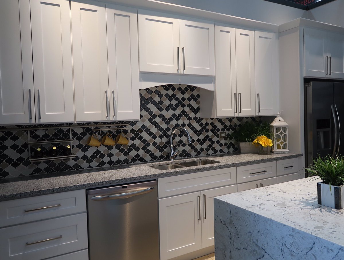 C_G_Direct's tweet photo. Enjoy this beautiful white shaker kitchen with its elegant waterfall and amazing wall decal: "Kitchens are made to bring families together" https://t.co/NLNBwSlUTR