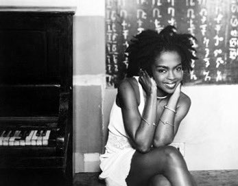 Happy Birthday to Lauryn Hill, a beautiful female singer of rap and soul and a wink also miles davis  