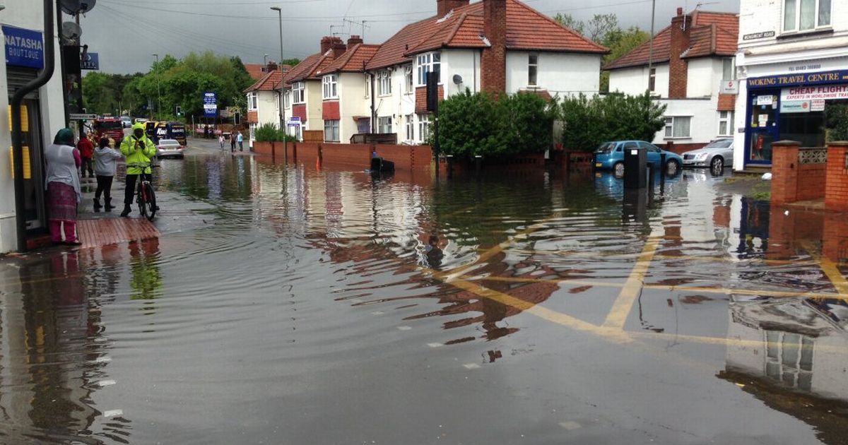 pumpcouk's tweet photo. Flooding in Woking: A year on from when heavy rain caused major disruption and transformed the streets.

Read more: https://t.co/8W71cvKIea https://t.co/8Tr2qWnq4D