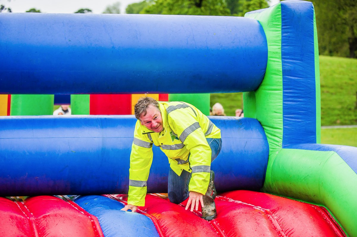 GRWPhotoBIZ's tweet photo. @paulmdchon gets stuck in on the beer run inflatable @DCHnews #DCHFEST #Plymouth #eventphotographer https://t.co/QYRT46QztD