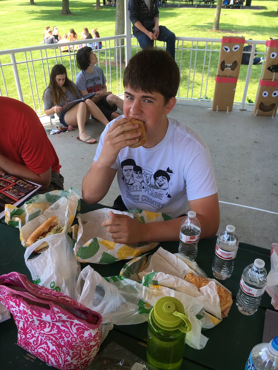 HSPrincipal716's tweet photo. John "Bags" faces a challenge today at lunch event...Can he consume 3 footlong subs? Battle of man vs food! Thanks @SUBWAY for the donation https://t.co/nxvqBJG1ZN