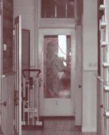 RIParanormal_'s tweet photo. An #apparition is seen in at the back door of the Prince Solms. Two pictures taken at different times with different investigators. https://t.co/zxsaNQislq