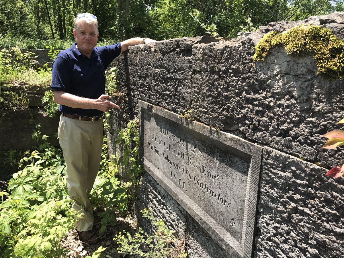 NYSCanalCorp's tweet photo. NYS Canal Director Stratton shows off the engineer's plate at Old Erie Canal Lock 28, dedicated in 1841. https://t.co/CO89VKfRCm