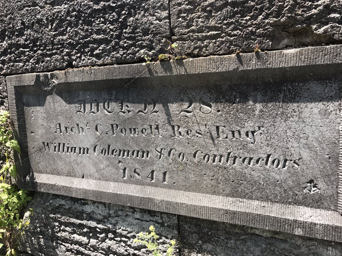 NYSCanalCorp's tweet photo. NYS Canal Director Stratton shows off the engineer's plate at Old Erie Canal Lock 28, dedicated in 1841. https://t.co/CO89VKfRCm