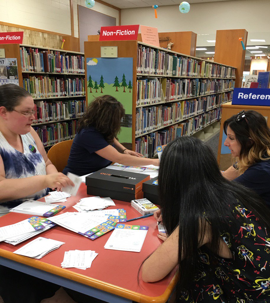 levittownpl's tweet photo. Post Festival organizing. If you didn't make it, plenty of time to still register for Summer Reading. https://t.co/u3bj4W3UKY