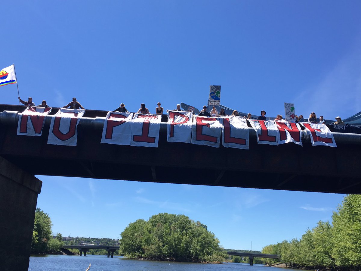 cluttercoco's tweet photo. #HandsAcrossTheWater rally in Fredericton. @CouncilofCDNs #NoEnergyEast #2RiskEE https://t.co/lz8a57ZdgI https://t.co/1vitL6HoQg