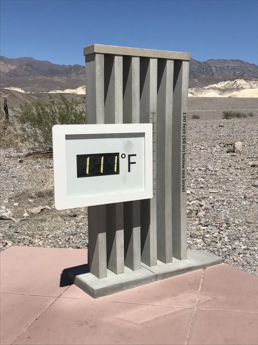 Thermometer sign reads 111 degrees Fahrenheit