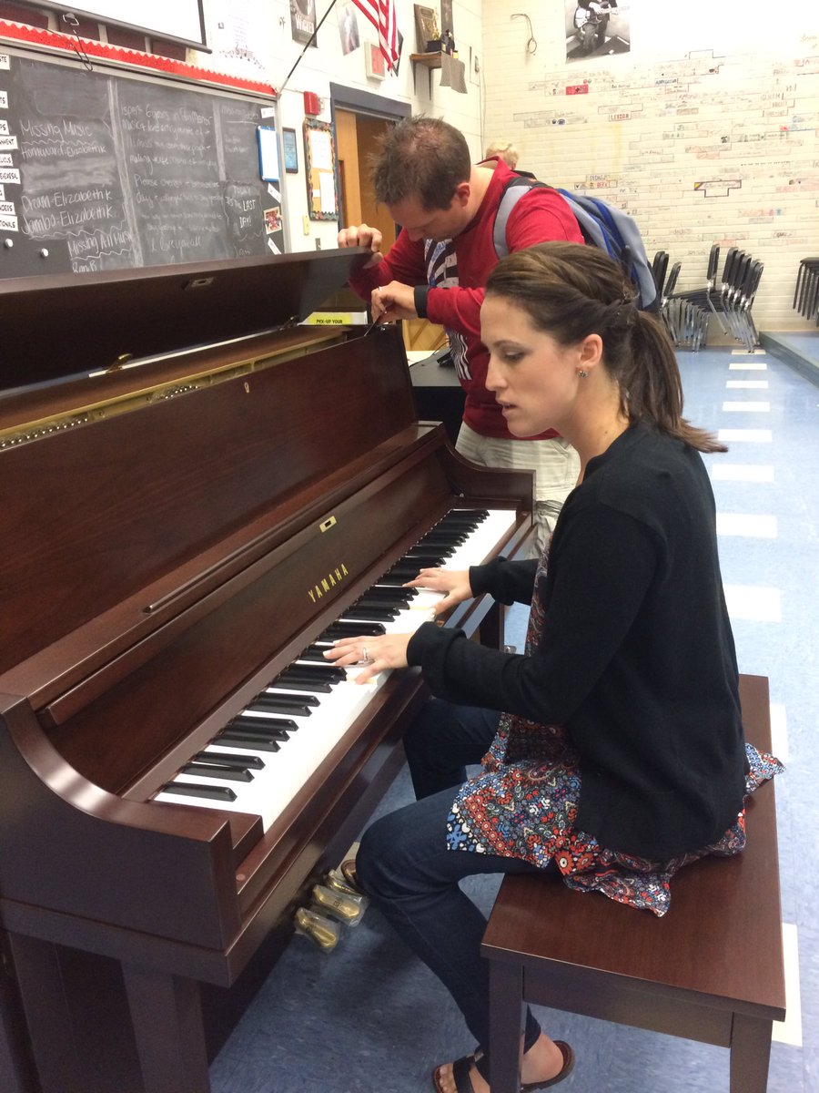 OrchPM's tweet image. Mrs. Ciemiewicz testing out her new piano!! It's like Christmas in the HS music dept!! 😃🎶🎹