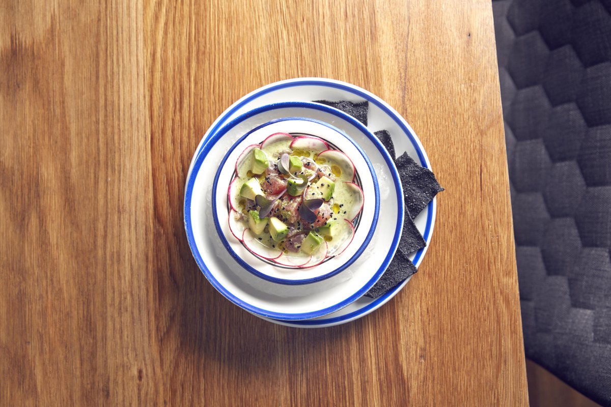 Our Tuna Ceviche served with squid ink chips, is perfect for sharing