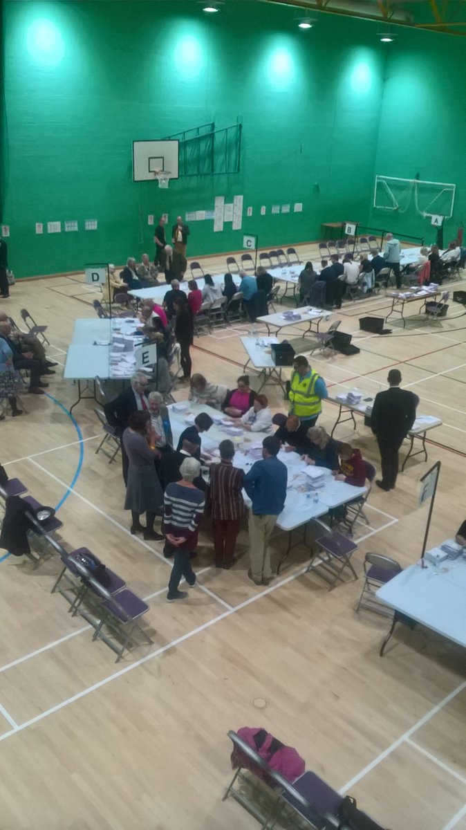 Party members inspect ballot papers. Anticipation growing for 2.30am announcement #arguselection