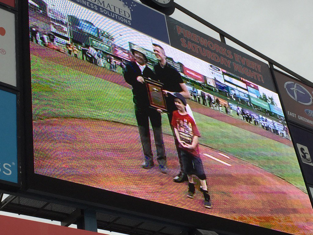 DavidGravesNG's tweet photo. .@nationalgridus #BigBrother Tim Rondeau receives #HomeTownHero award at tonight's #PawSox game https://t.co/9TMl7ooRfk