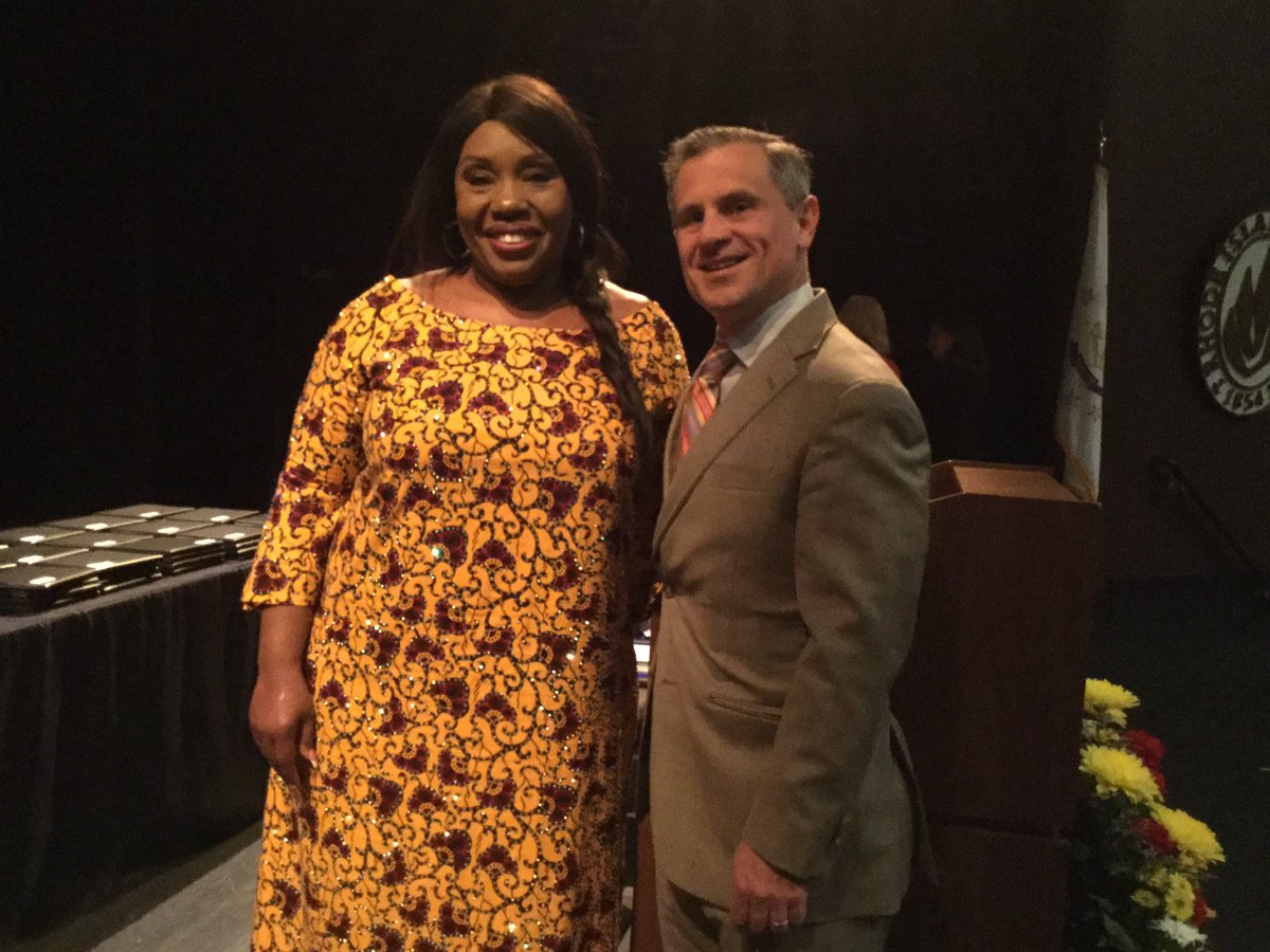 pvdschools's tweet photo. @J_S_E_C 's Nkoli Onye greets First Gentleman @AndyMoffit at tonight's commencement. #ppsd2017 https://t.co/Ddo6ZvIuwE