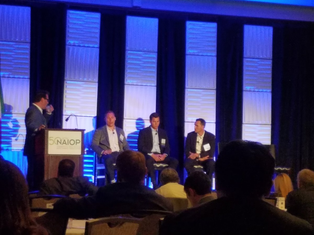 Multi-story distribution centers and other infill industrial real estate development strategies discussed at #NAIOPICON