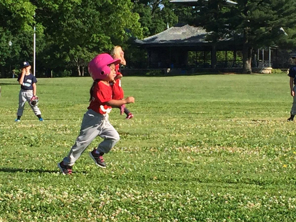 The little ones are out as the Reds take on the Yankees in Pee Wee baseball at Garfield park. RBI Play Ball Indiana.