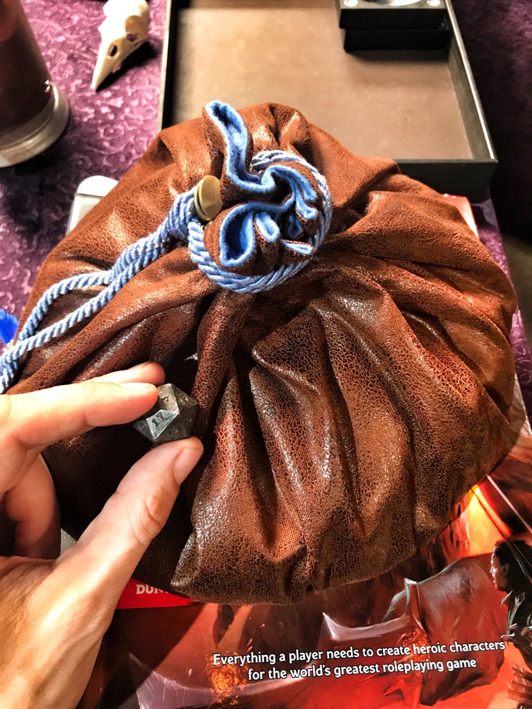 VoiceOfOBrien's tweet photo. @LauraBaileyVOโs dice bag is as big as a cowโs stomach. https://t.co/IzKj8oFIba