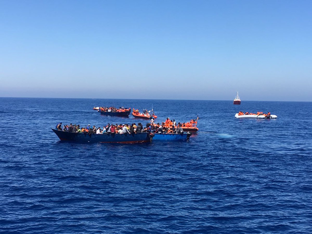 MSF_Sea's tweet photo. Let's be clear, when you see people on boats like this in the #Mediterranean you have only two options: you rescue them or you rescue them. https://t.co/gNR7kxOk2D