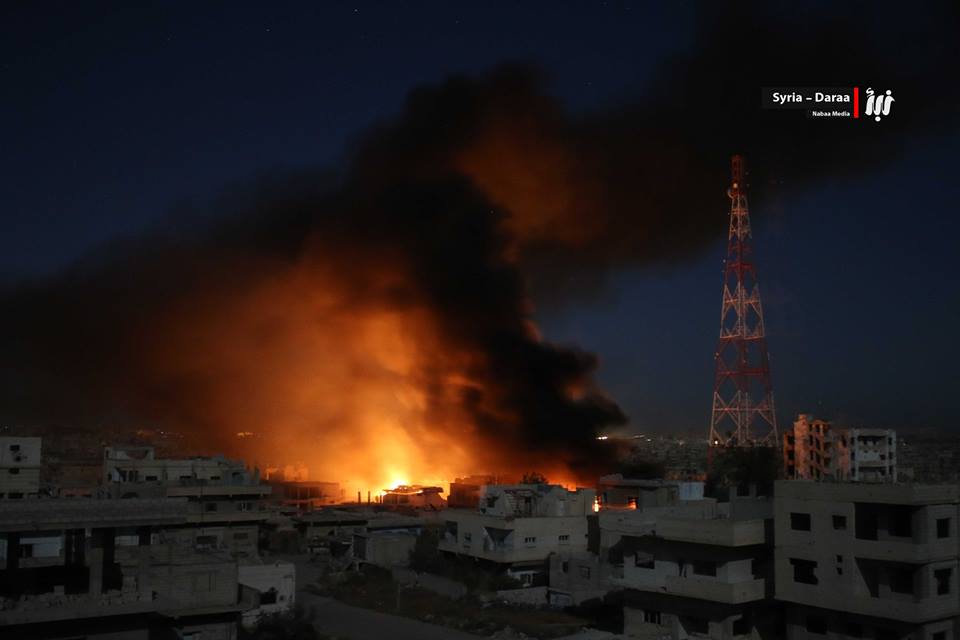 QalaatAlMudiq's tweet photo. #Daraa: symbol of Revolution, Al-Omari Mosque on fire last light after area hit by incendiary bomb. https://t.co/Dn6myCSM50 https://t.co/wcSRUsJGJ4