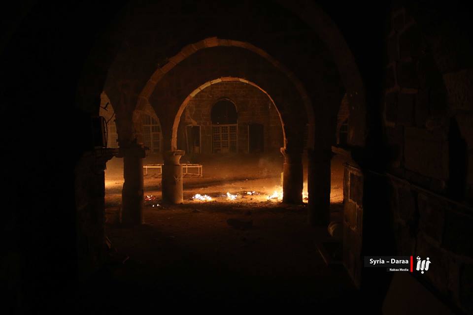 QalaatAlMudiq's tweet photo. #Daraa: symbol of Revolution, Al-Omari Mosque on fire last light after area hit by incendiary bomb. https://t.co/Dn6myCSM50 https://t.co/wcSRUsJGJ4