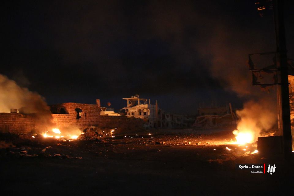 QalaatAlMudiq's tweet photo. #Daraa: symbol of Revolution, Al-Omari Mosque on fire last light after area hit by incendiary bomb. https://t.co/Dn6myCSM50 https://t.co/wcSRUsJGJ4