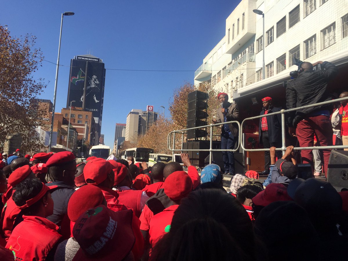 ewnreporter's tweet photo. #EFFTransnet Malema is addressing his supporters outside the JHB Central Police Station.TK https://t.co/RhBASJV0DV