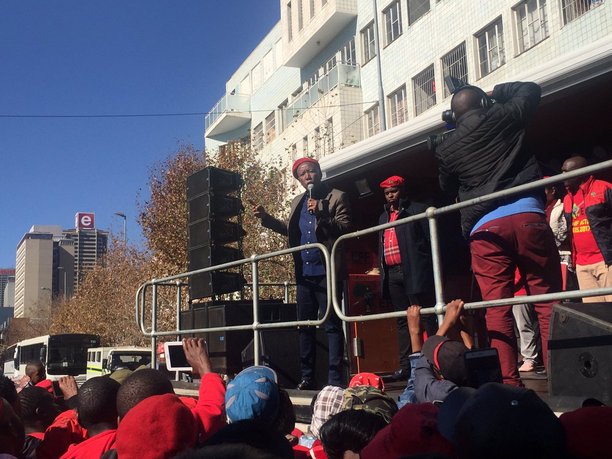 ewnreporter's tweet photo. #EFFTransnet Malema is addressing his supporters outside the JHB Central Police Station.TK https://t.co/RhBASJV0DV