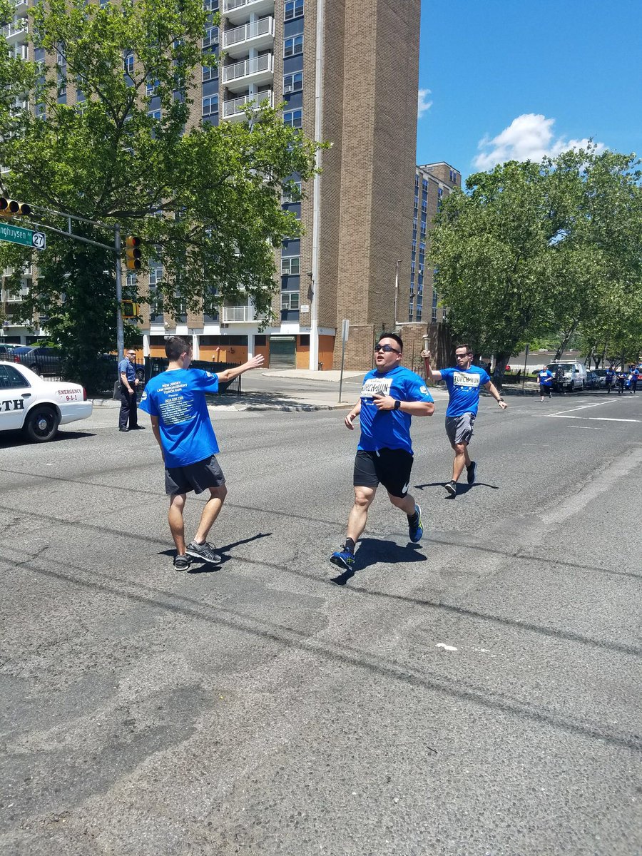ElizabethPBA4's tweet photo. Newark PD handing the torch over to Off.B.McDonough's son for the next run. @NJSPBA @SONewJersey https://t.co/IBiJA5IBpi