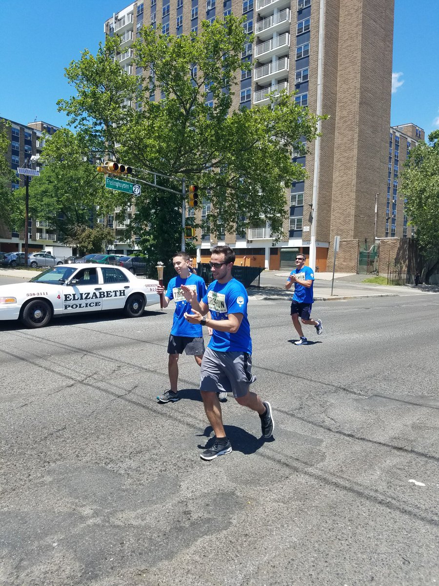 ElizabethPBA4's tweet photo. Newark PD handing the torch over to Off.B.McDonough's son for the next run. @NJSPBA @SONewJersey https://t.co/IBiJA5IBpi