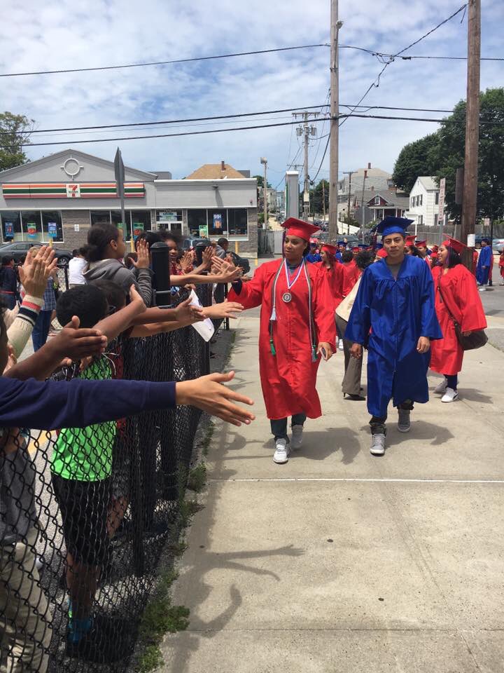 AnnaKids1st's tweet photo. .@CFSchoolsRI tradition graduate stroll. High fives w/ young Warriors shows they can do it too! #firstgenisreal  @vcapellan @FrankDSanchez https://t.co/JLNKRC1Ksu