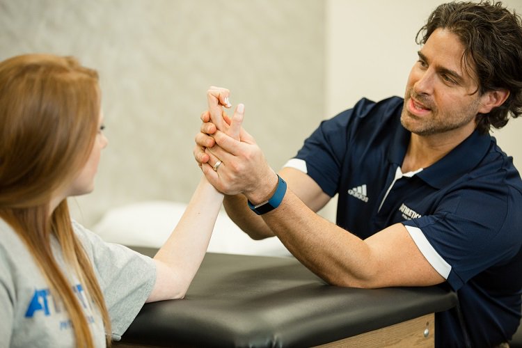 Athletico's tweet photo. As #HTW2017 continues, we are highlighting our Hand Therapy services for this week's #FridayFeature! Learn more – https://t.co/gcoPwA5bWS https://t.co/rvtbOC215e
