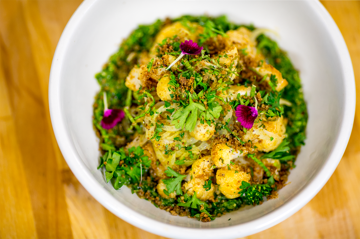 OurTableCoOp's tweet photo. Roasted Cauliflower, Fennel, Radish, &amp; Arugula Pesto. One of the delectable creations from the OTC kitchen, tonight on the happy hour menu! https://t.co/ud62822VVu