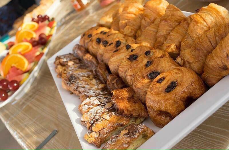 Enjoy an on board breakfast consisting of pastries, Cheese, Cream Cheese, Yogurt and a platter of fresh fruit, Juice or Coffee!