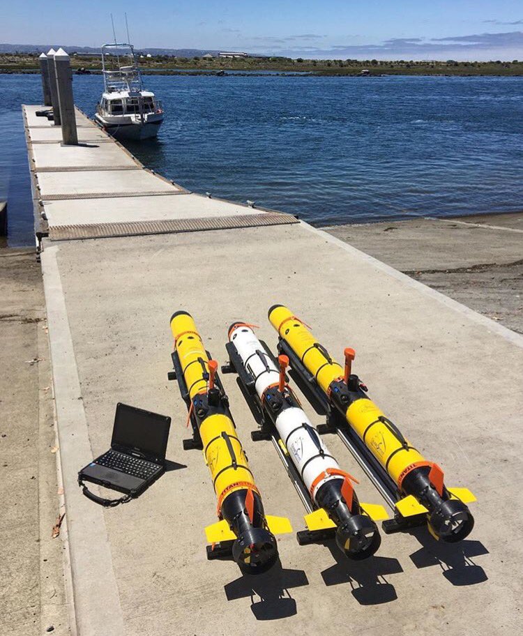 The Orca crew conducts underwater harbor survey using OceanServer IVER3 AUVs.