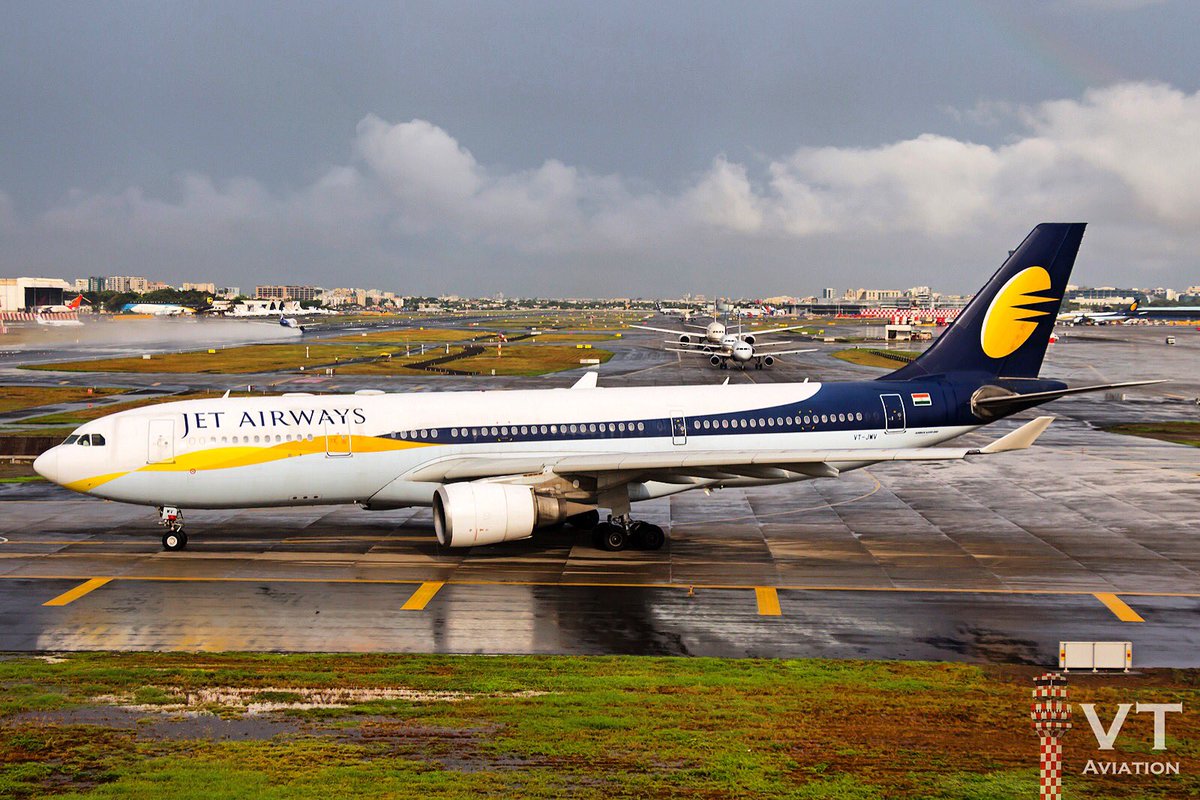 TeamVTAviation's tweet photo. @jetairways #Airbus A330-200 hold shorts #RW27 of @CSIAMumbai after a heavy downpour. ❤️😍✈️ #Avgeek https://t.co/qlgSypeZF5