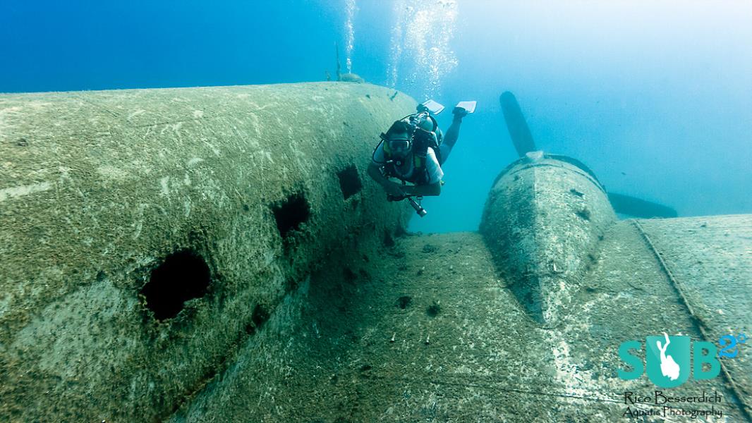 thesub2o's tweet photo. Different style of exploring an #airplane - exclusive for divers only! Photo by @RicoBesserdich at #Sundiving #scuba https://t.co/aIKbMeB288 https://t.co/Ky2v3Gn7Ns