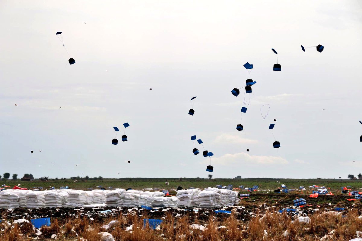 WFPSupplyChain's tweet photo. Success! @WFP_SouthSudan has completed a test airdrop of food, water &amp; relief items to the town of #Ganyiel. Well done, team! #innovation https://t.co/uEvDkyceLQ
