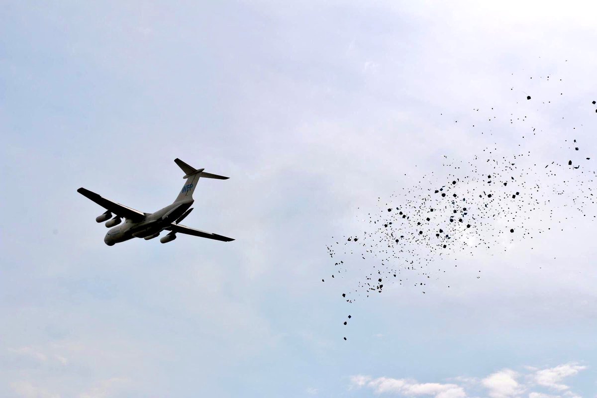 WFPSupplyChain's tweet photo. Success! @WFP_SouthSudan has completed a test airdrop of food, water &amp; relief items to the town of #Ganyiel. Well done, team! #innovation https://t.co/uEvDkyceLQ