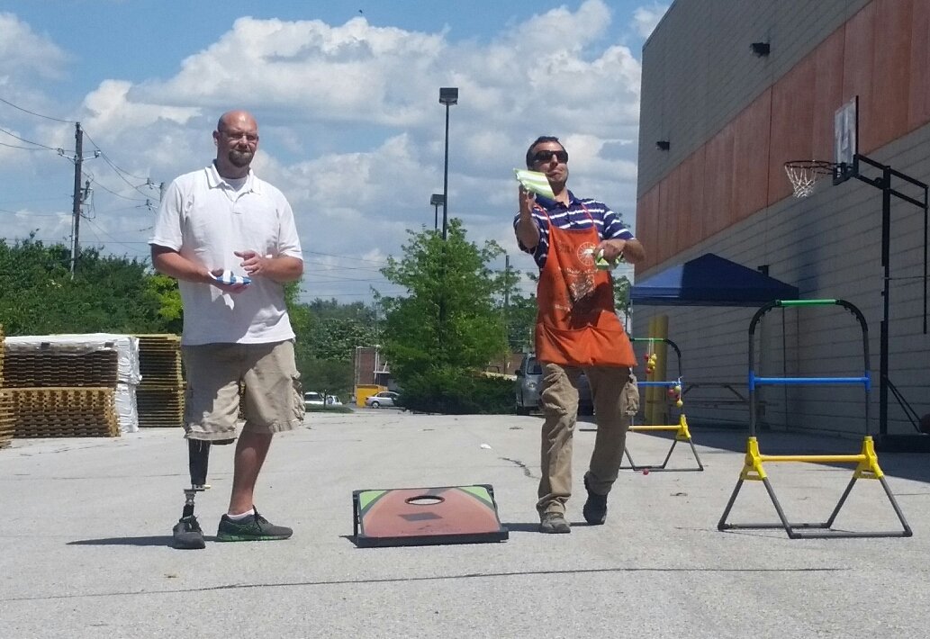 ginamarie280's tweet photo. The cornhole @thd2014 is getting intense!! @brischro94 @jeff_trent @Nisseinny @MarkMiller4519 @mlindsey1223 @BPlantenberg #2014memorial https://t.co/NAWhuthgkk