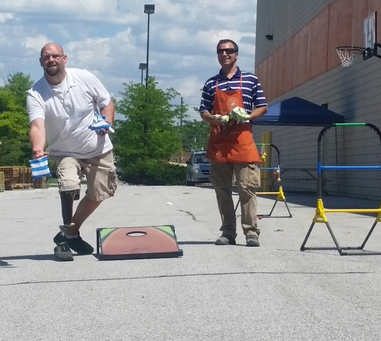 ginamarie280's tweet photo. The cornhole @thd2014 is getting intense!! @brischro94 @jeff_trent @Nisseinny @MarkMiller4519 @mlindsey1223 @BPlantenberg #2014memorial https://t.co/NAWhuthgkk