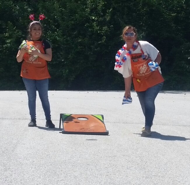 ginamarie280's tweet photo. The cornhole @thd2014 is getting intense!! @brischro94 @jeff_trent @Nisseinny @MarkMiller4519 @mlindsey1223 @BPlantenberg #2014memorial https://t.co/NAWhuthgkk