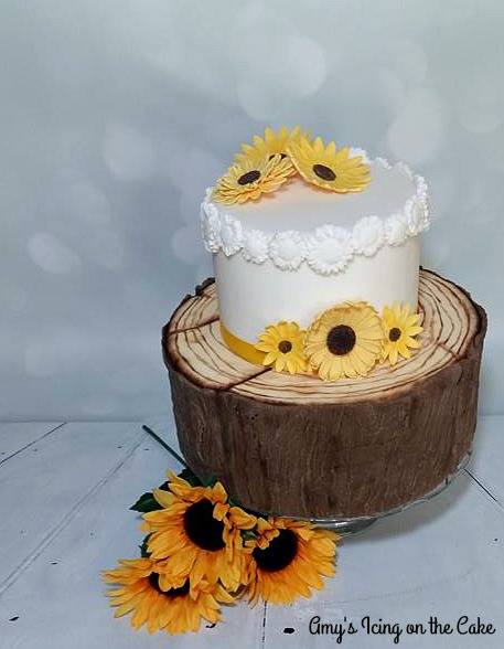 AmyChapman25's tweet photo. Sunflower and tree stump cake #amysicingonthecake https://t.co/G6SWzH8yyS