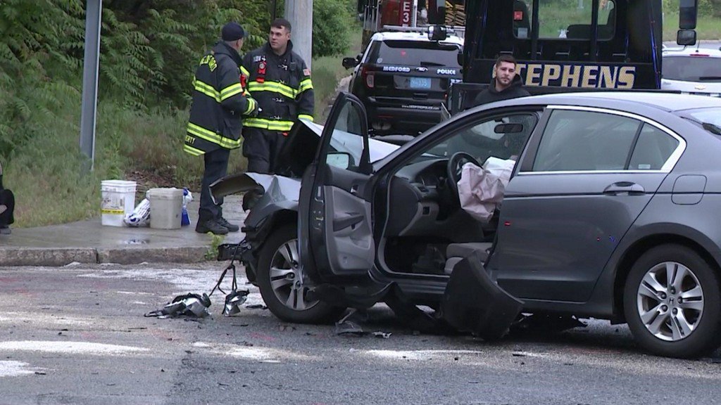 WCVB's tweet photo. Vehicle collides with police cruiser, pushes onto sidewalk https://t.co/dIWg5NufM5 https://t.co/xhYOgCobad