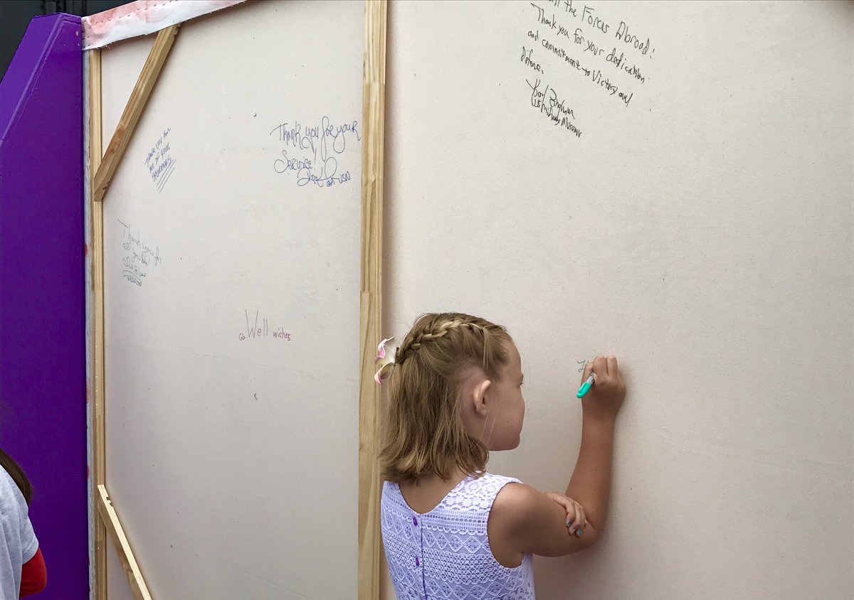 USSMidwayMuseum's tweet photo. Guests sign the back of the Hero Canvas Project displays - thanking service men &amp; women for their sacrifice. 🇺🇸 #legacyweek17 #memorialday https://t.co/jHduuLWbcB
